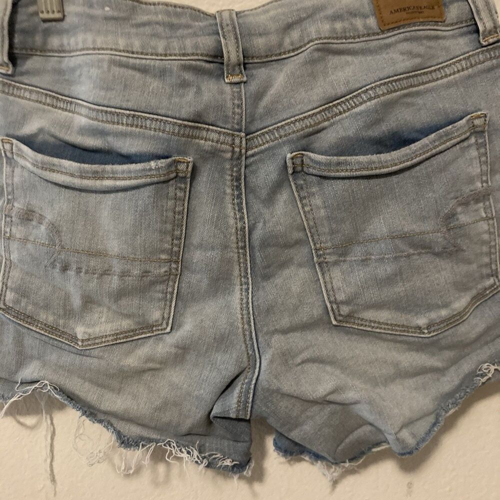 AMERICAN EAGLE OUTFITTERS Next Level Stretch light wash zip fly cut off shorts 6 - Picture 11 of 12